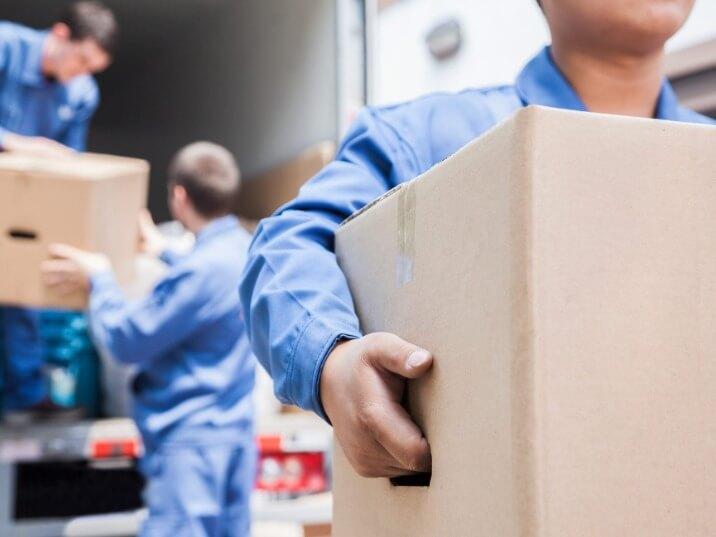 local movers loading belongings into a truck